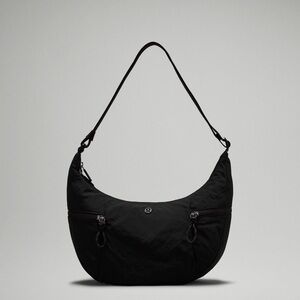 Lululemon Athletica Black Slouchy Sling Bag 6L. NWOT